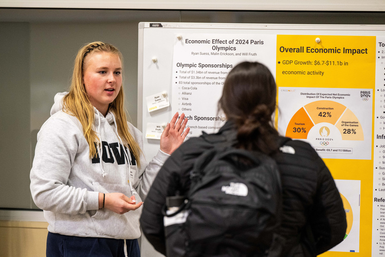 2025 FYS Poster Session presenter and their poster titled Economic Impact of 2024 Paris Olympics