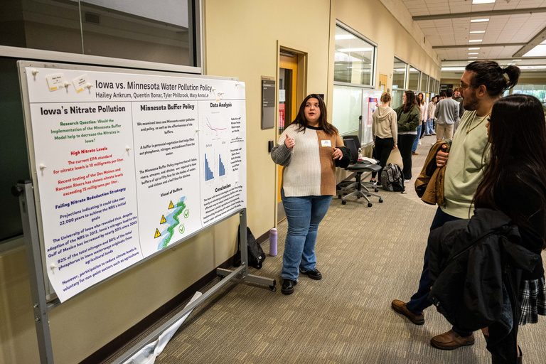 2025 FYS Poster Session presenter with poster titled Iowa vs Minnesota Water Pollution Policy